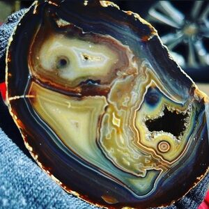Large half cut Brazilian Agate with crazy faces and polish